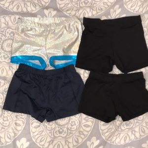4 pairs of Petite Adult (PA) dance shorts by Motionwear, Butterfly and BCG.